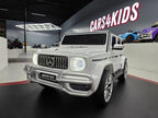 Mercedes G63 AMG 2-Sitzer Kinder Elektroauto lizenziert in weiß oder schwarz – Leder, 8km/h, EVA, Fernbedienung, MP3, Stoßdämpfer