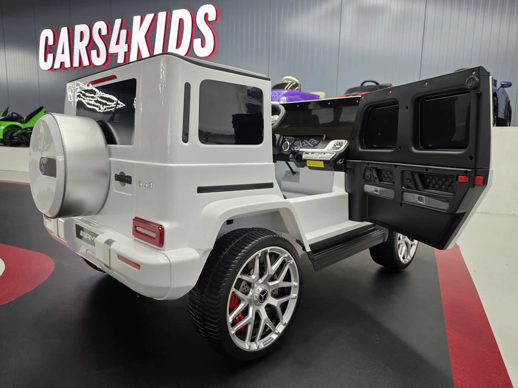 Mercedes G63 AMG 2-Sitzer Kinder Elektroauto lizenziert in weiß oder schwarz – Leder, 8km/h, EVA, Fernbedienung, MP3, Stoßdämpfer