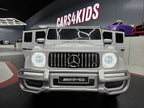 Mercedes G63 AMG 2-Sitzer Kinder Elektroauto lizenziert in weiß oder schwarz – Leder, 8km/h, EVA, Fernbedienung, MP3, Stoßdämpfer