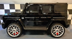 Mercedes G63 AMG 2-Sitzer Kinder Elektroauto lizenziert in weiß oder schwarz – Leder, 8km/h, EVA, Fernbedienung, MP3, Stoßdämpfer