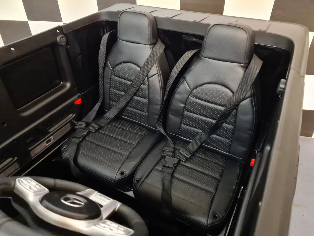 Mercedes G63 AMG 2-Sitzer Kinder Elektroauto lizenziert in weiß oder schwarz – Leder, 8km/h, EVA, Fernbedienung, MP3, Stoßdämpfer
