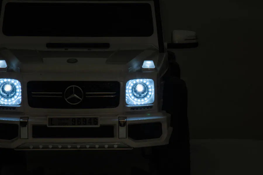 Mercedes G63 AMG 6x6 Kinder Elektroauto lizenziert in weiß oder schwarz – Leder, EVA, Fernbedienung, MP3